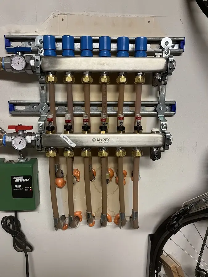 Plumber performing Water Heater Repair at a residential property in La Habra Heights